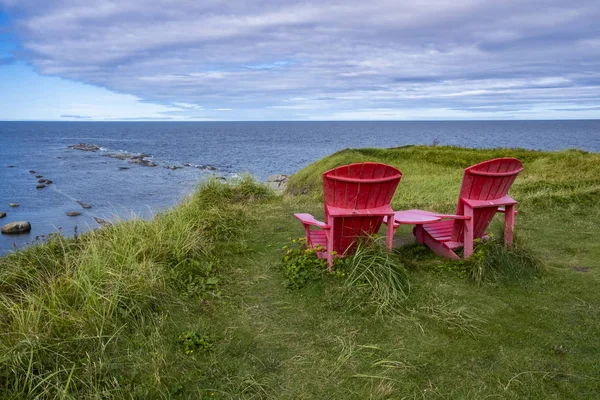 Two Red Adirondack Chairs Green Point Overlooking Gulf Lawrence Newfoundland — Stock Photo, Image