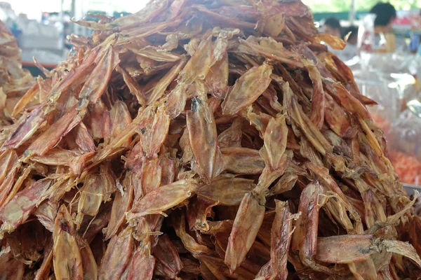 pile of Dried squid Seafood processing for sale at Seafood local Market in Chonburi, Thailand