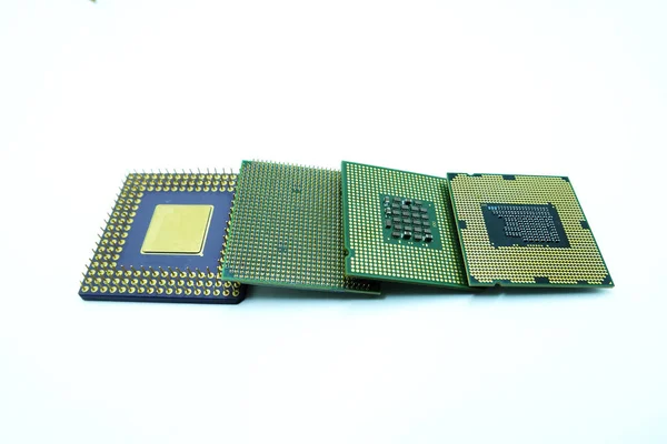 Many old computer processor microchips isolated on white background, Sort the old version to the new version, Computer Hardware