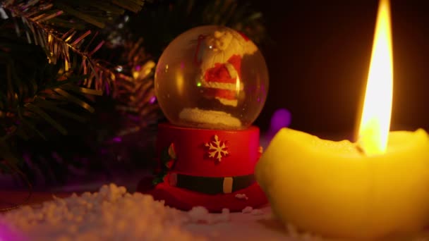 Animatie Van Kaarsen Branden Sneeuw Globe Voor Kerstdag Collectie — Stockvideo