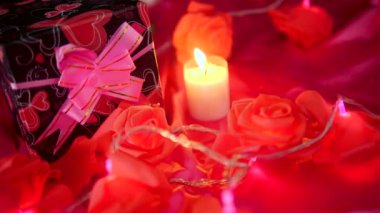 Greeting Valentine day with gift boxes, candle burning and flower rose footage collection