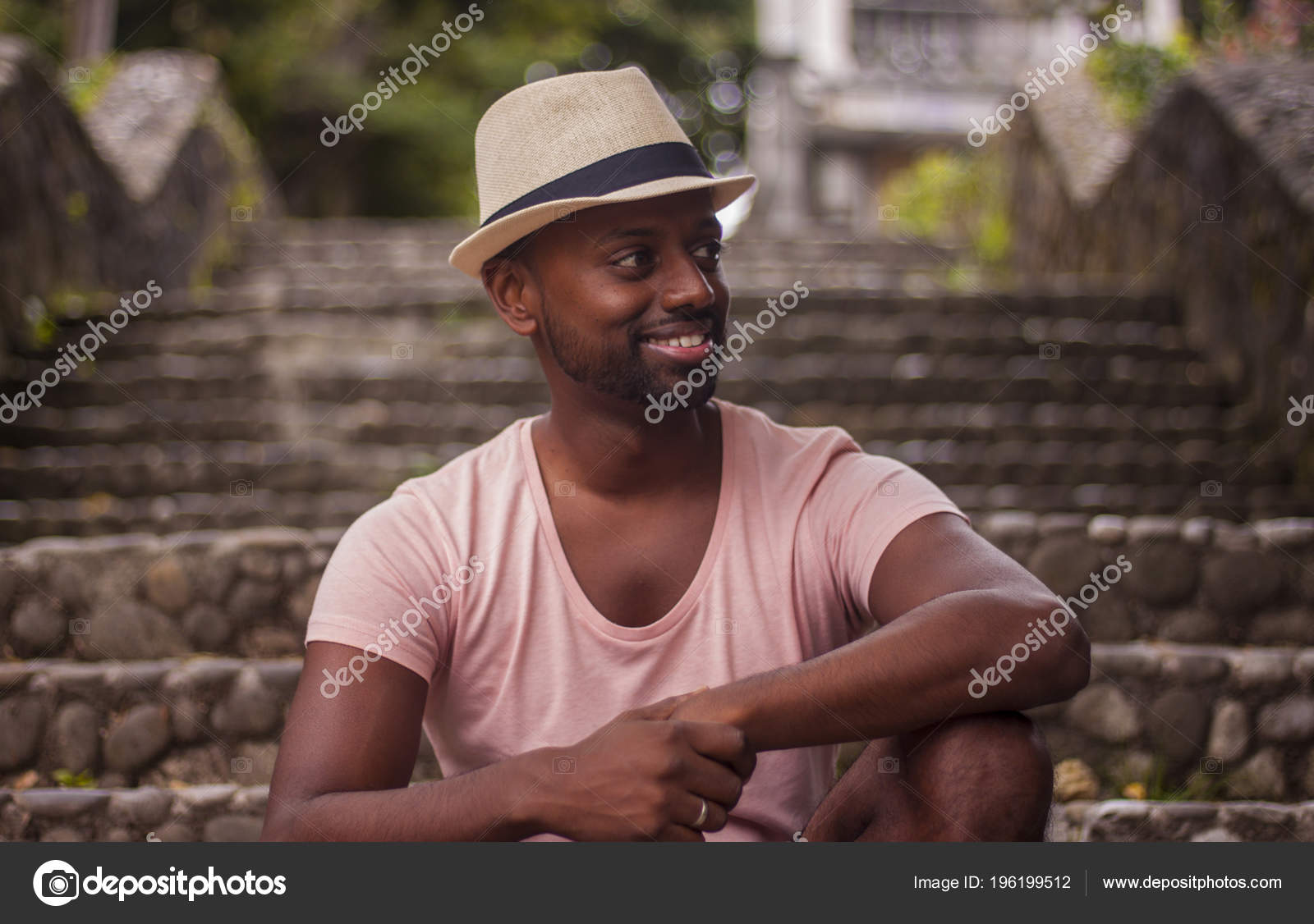 black guy with hat