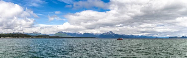 Beautiful Panorama Tiny Fishing Boat Sailing Mountains Clouds Blue Sky Stock Photo