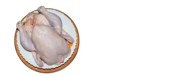 Egy Közeli Felvétel Egy Egész Csirkéről Egy Tányéron Egy Deszkán — Stock Fotó