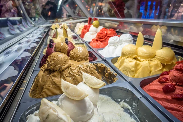 assorted ice cream on display in store