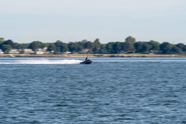 Abstract of man on a jetski moving fast — Stock Photo, Image
