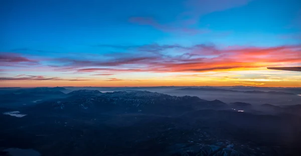 Západ slunce nad Colorado skály z letadla — Stock fotografie