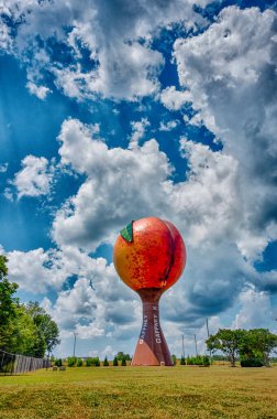 Peachoid Peach Water Tower in Gaffney South Carolina SC along Interstate 85. clipart