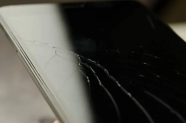 cracks on smartphone glass/cracks on black smartphone glass