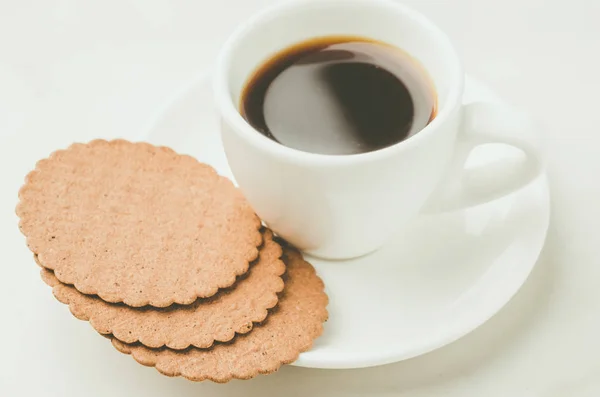 breakfast with Coffe espresso white cup with cookies/breakfast with Coffe espresso white cup with cookies on a white background. selective focus
