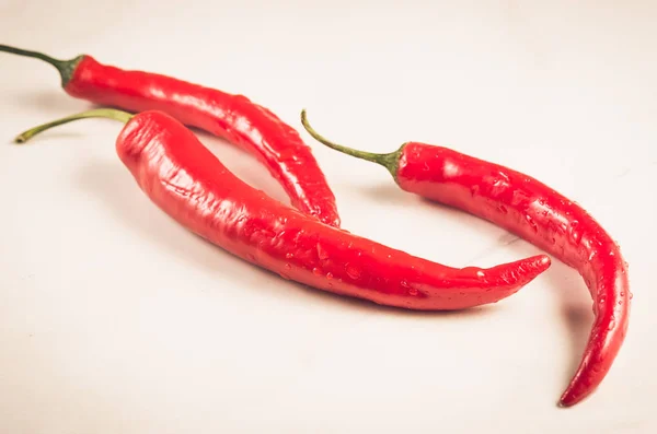fresh red chili pepper/fresh red chili pepper on a white background. selective focu