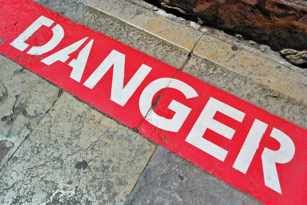 Danger Perigo Sign Stone Background — Stock Photo, Image