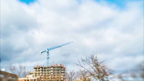 Time Lapse Moving Crane Construction Site Background Running Clouds Lensbaby — Stock Video