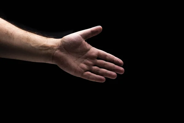 Isolated men hand with black background