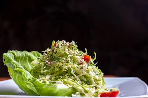 Salad with cabbage and dill in a bowl. Close up — Stock Photo, Image