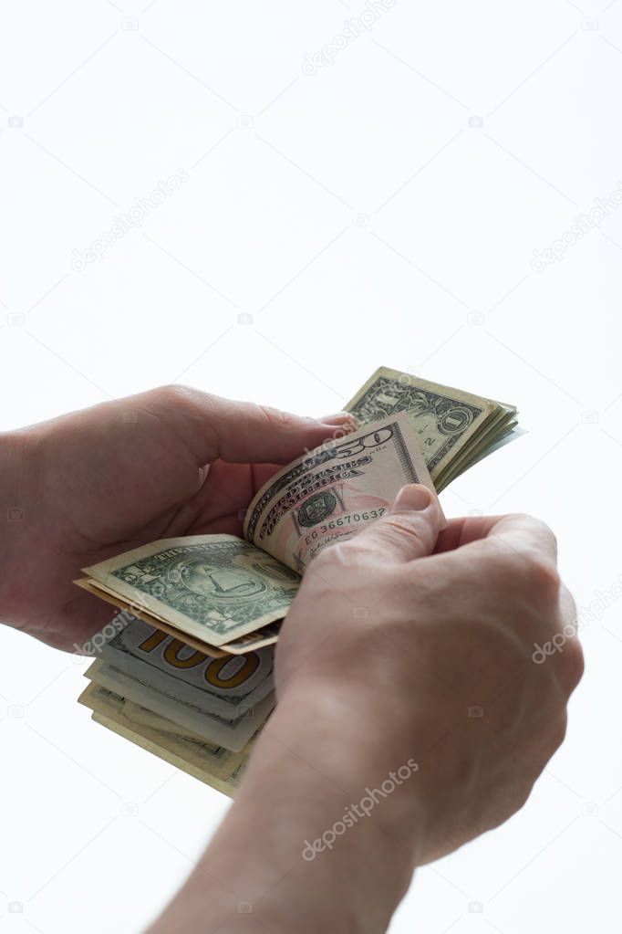 man counting money with white fund