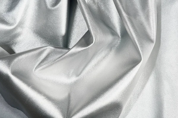 Zilveren kleur stof textuur. — Stockfoto