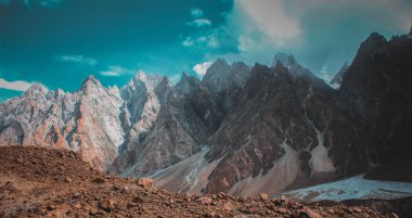 A landscape of giant mountain (Passu Cones) clipart