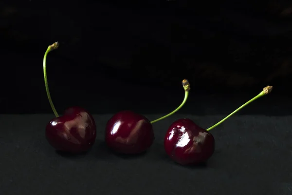 Three Berries Cherries Front Dark Background — Stock Photo, Image