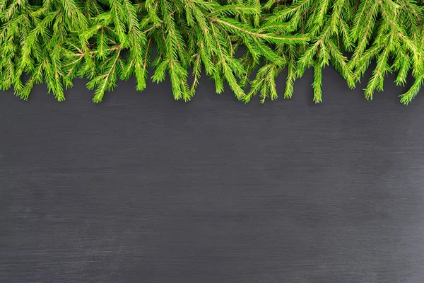 Christmas Border - tree branches with on black, Flat lay mock-up