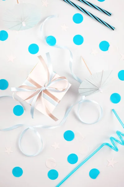 Blue party accessories over the white background. Invitation, birthday, bachelorette party, baby boy shower concept