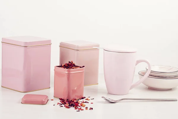 Different pink tea containers with fruit tea. Mockup, copy space — Stock Image Different Pink Tea Containers Fruit Tea Mockup Copy Space Stock Picture