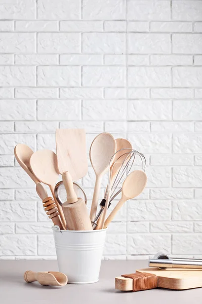 Various kitchen utensils on white background