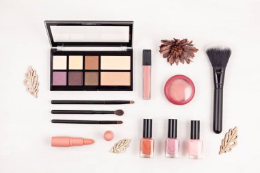 Mockup of makeup cosmetic products, flat lay, top view. Woman beauty fashion image for sales, shopping, fashion and beauty blogs clipart