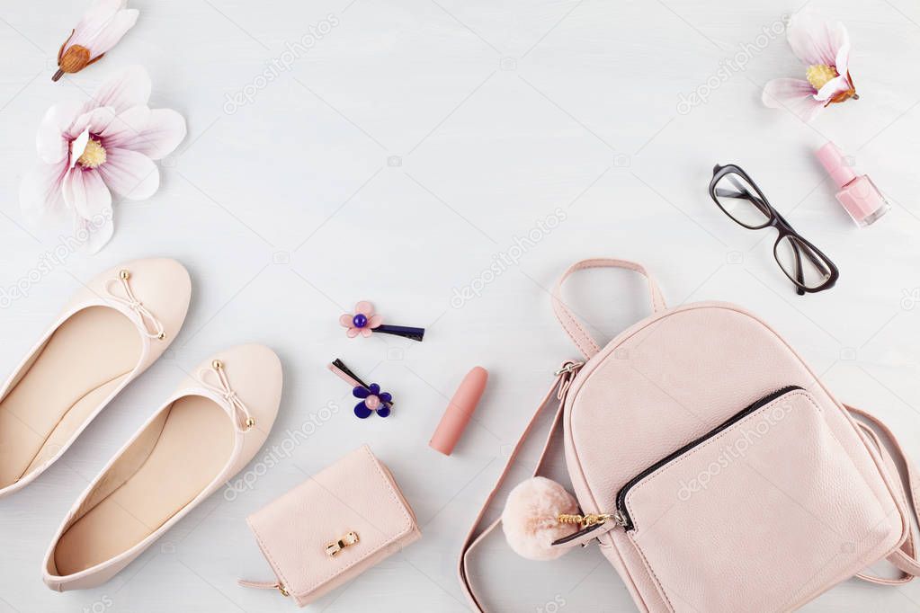 Flat lay with girls spring summer accessories in pink pastel ton