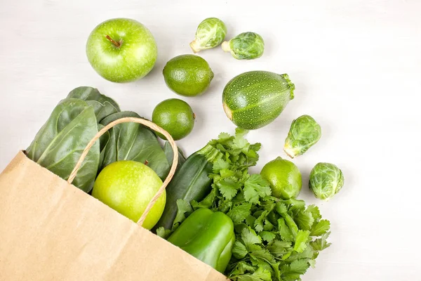 Top view of fresh organic vegetables in green colo — Stock Photo, Image