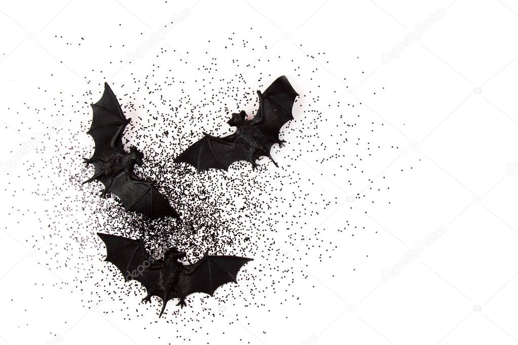 Top view of Halloween decoration with plastic bats
