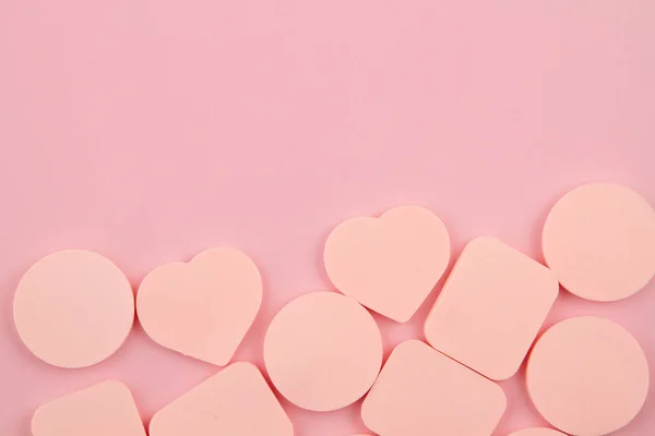 Makeup foundation sponges over pink background — Stock Photo, Image