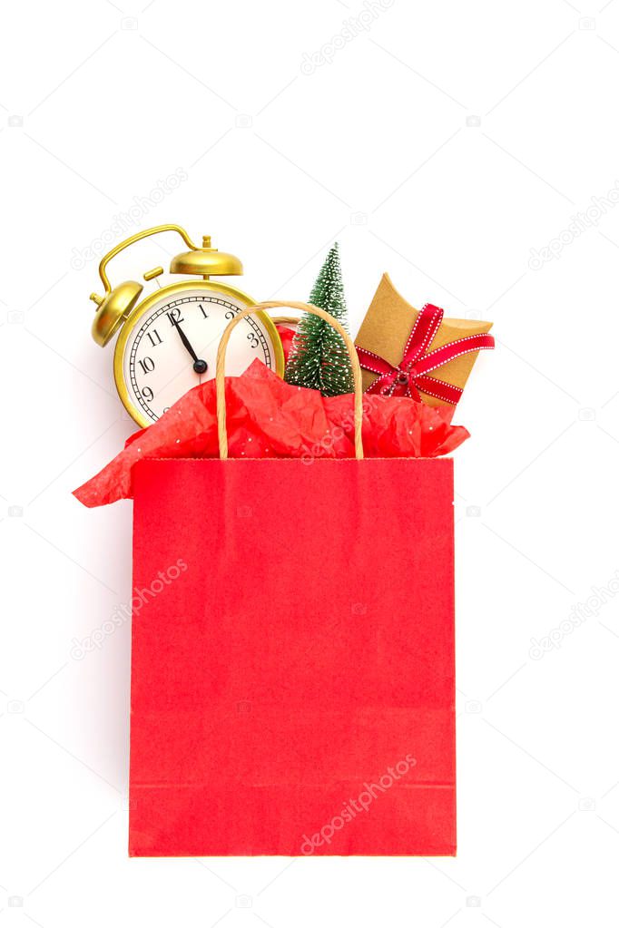 Paper bag with christmas gifts, christmas tree and decoration