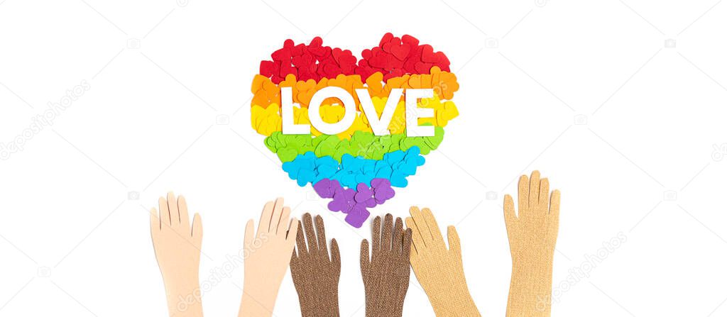 Paper heart with rainbow color stripes symbol of LGBT gay Pride. Love, diversity, tolerance, equality concept