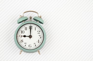 Flat lay with vintage alarm clock over the striped background  clipart