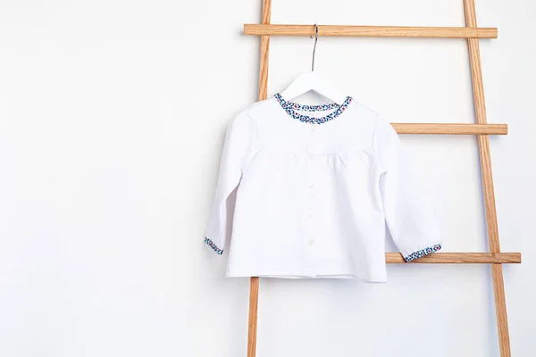 Cute Newborn Clothes Hanging Rack Organic Cotton Baby Apparel Mockup — Stock Photo, Image