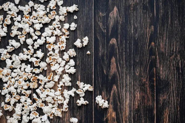 White popcorn on a vintage wooden background — Stock Photo, Image