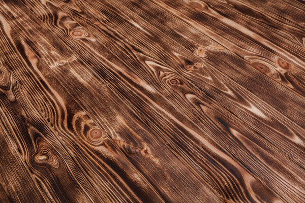 Burned boards natural wooden background 