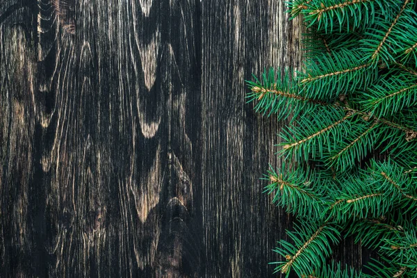 小ぎれいなな枝暗いヴィンテージの木製の背景 クリスマス コンセプト — ストック写真