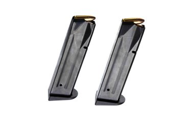 Dolu tabanca üzerinde beyaz yüzey Dergisi