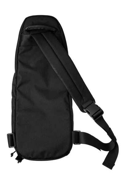 Moderna mochila negra sobre su hombro aislada en la espalda blanca Imágenes de stock libres de derechos