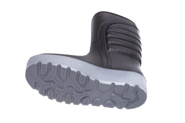 Beyaz arka üzerinde izole traktör tabanı ile sıcak kauçuk botlar