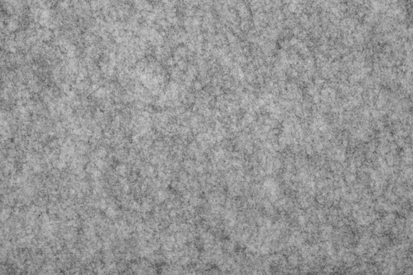 Felt Texture Background. Soft grey felt material. Surface of fel