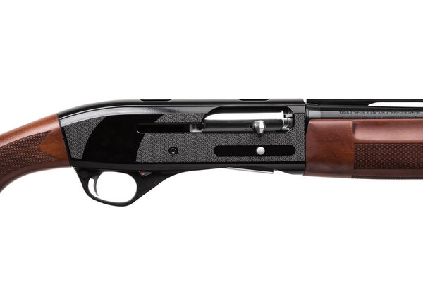 semi-automatic shotgun with a wooden butt and forearm on black b