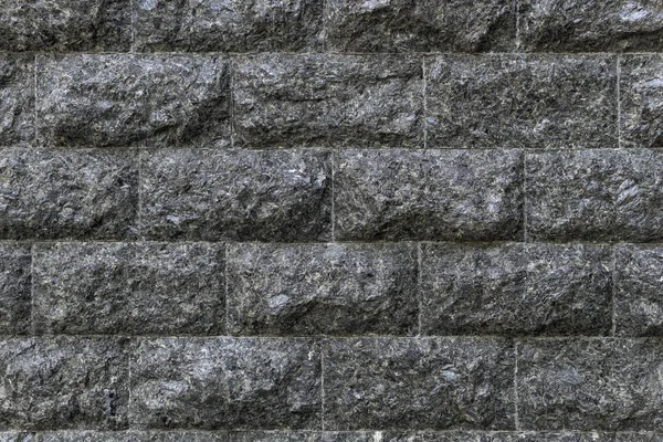 Rough granite Brick wall background. Background texture of stone — Stock Photo, Image