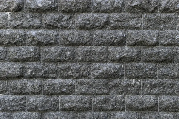 Rough granite Brick wall background. Background texture of stone — Stock Photo, Image