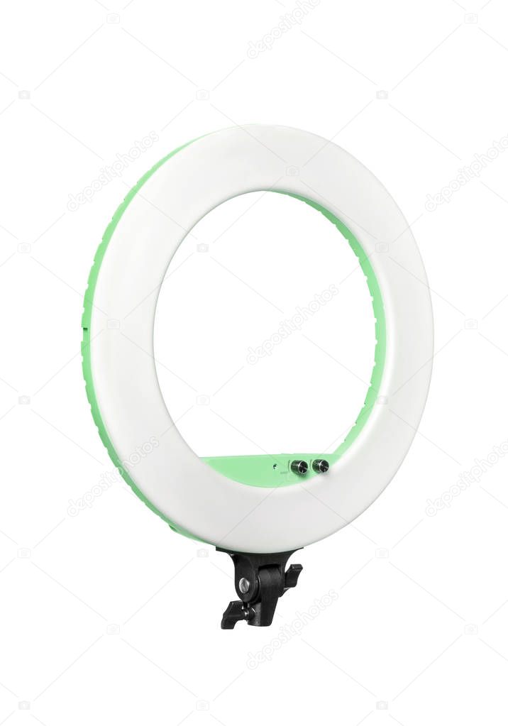 Closeup of circular neon LED lamp isolated white background. Pop