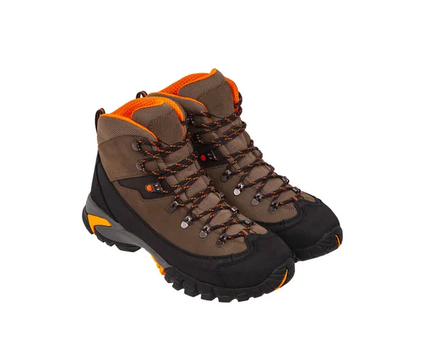 Modern mountain boots isolate on a white background. Shoes for outdoor activities and travel.