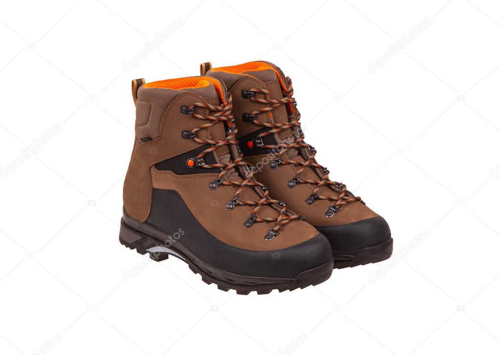 Modern mountain boots isolate on a white background. Shoes for outdoor activities and travel.