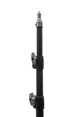 A close-up of the top part of a black light stand with adjustment knobs.